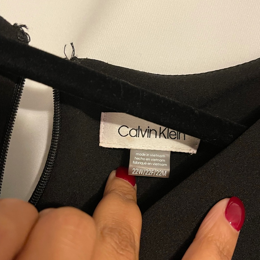 Black Calvin Klein jumpsuit.